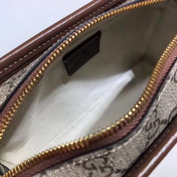 【原版皮】古驰/Gucci 印花手拿包,经典GG Supreme高级人造帆布匠心制成,点缀Fake和Not词语印花,在品牌标志性元素中注入诙谐意味,款号:636243
